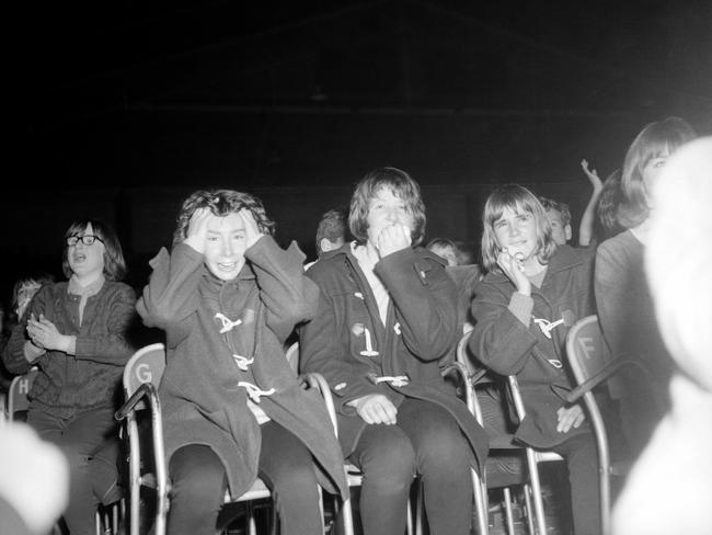 Many of their screaming fans struggled with their emotions at the band’s Melbourne concerts. Picture: Herald Sun Image Library