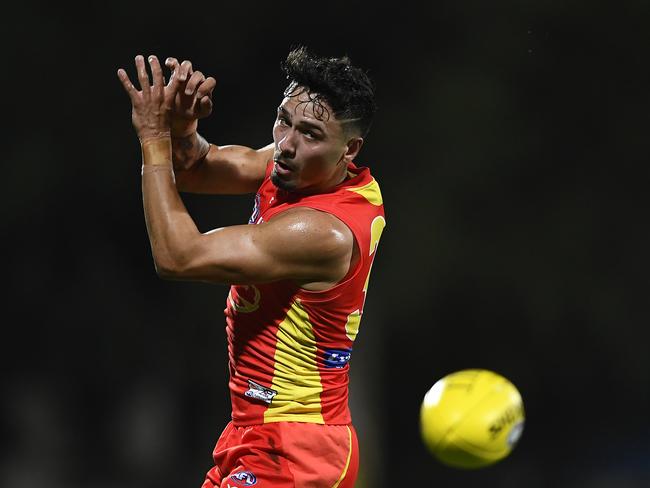 Izak Rankine of the Suns drops the ball during the 2019 JLT Community Series AFL match between the Gold Coast Suns and the Western Bulldogs at Great Barrier Reef Arena on March 03, 2019 in Mackay, Australia. (Photo by Ian Hitchcock/Getty Images)