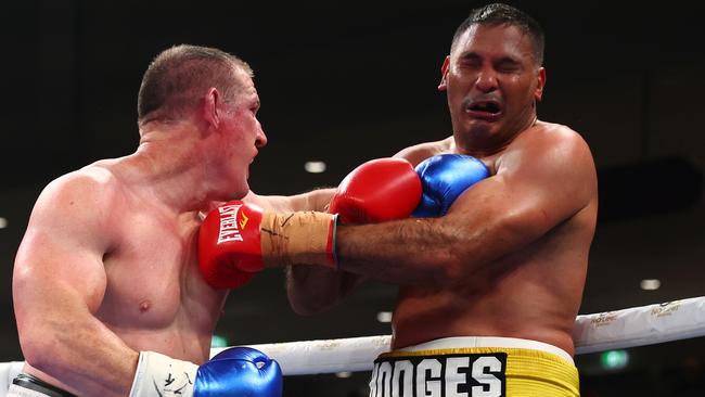 BRISBANE, AUSTRALIA - SEPTEMBER 15: Paul Gallen punches Justin Hodges during their bout at Nissan Arena on September 15, 2022 in Brisbane, Australia. (Photo by Chris Hyde/Getty Images)