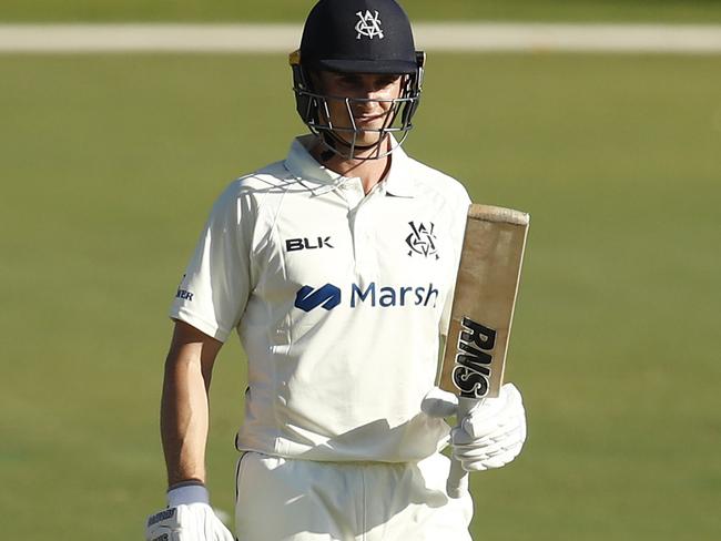 MELBOURNE, AUSTRALIA - APRIL 04: James Seymour of Victoria raises his bat after scoring 50 runs during day 2 of the Sheffield Shield match between Victoria and South Australia at Junction Oval on April 03, 2021 in Melbourne, Australia. (Photo by Darrian Traynor/Getty Images)