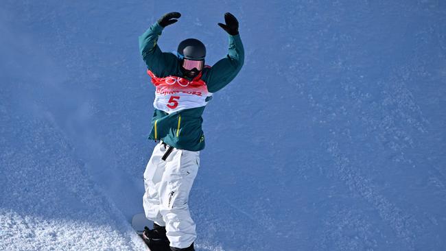 Australia's Tess Coady competes in the snowboard women's slopestyle final run during the Beijing 2022 Winter Olympic Games at the Genting Snow Park H &amp; S Stadium in Zhangjiakou on February 6, 2022. (Photo by Ben STANSALL / AFP)