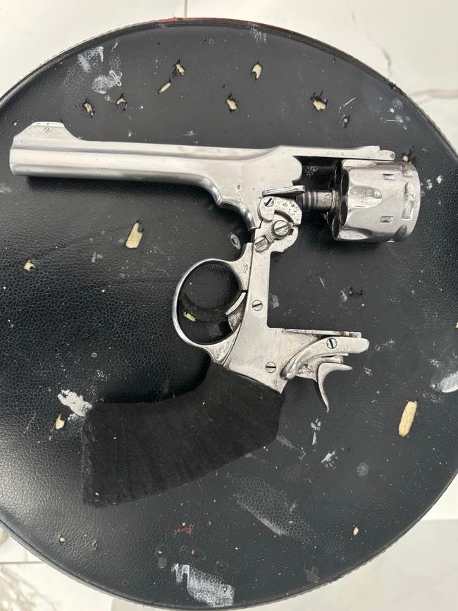 A loaded gun was found at the Paradise home. Picture: SAPOL