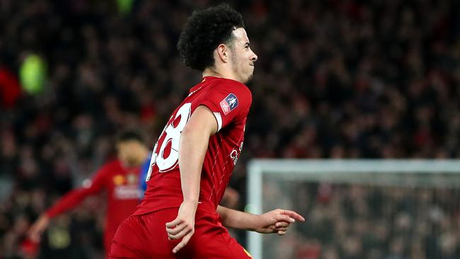 Curtis Jones celebrates after scoring for Liverpool against Everton at Anfield. Picture: Getty Images