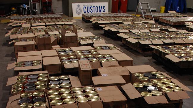 More than 3000 tomato tins full of ecstasy tablets were discovered.