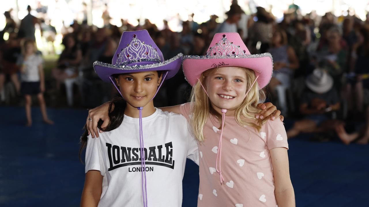 Kannika Clamp, 11, and Gabrielle Rohde, 8, at the Savannah in the Round music festival, held at Kerribee Park rodeo grounds, Mareeba. Picture: Brendan Radke