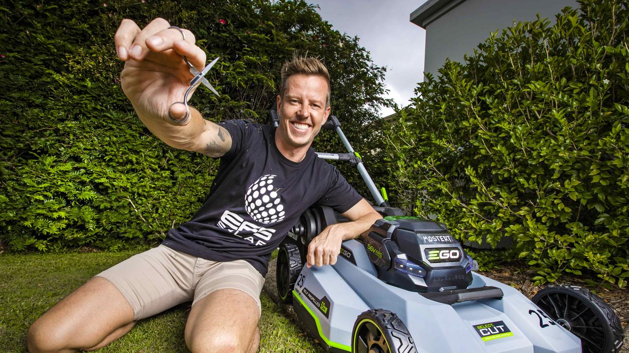 *** Embargoed for SUNDAY PAPERS ** V8 Supercars - Background is about the battle between James Courtney and Chaz Mostert on the track. JAMES Courtney with the "Chaz Mostert" lawnmower. Picture: NIGEL HALLETT