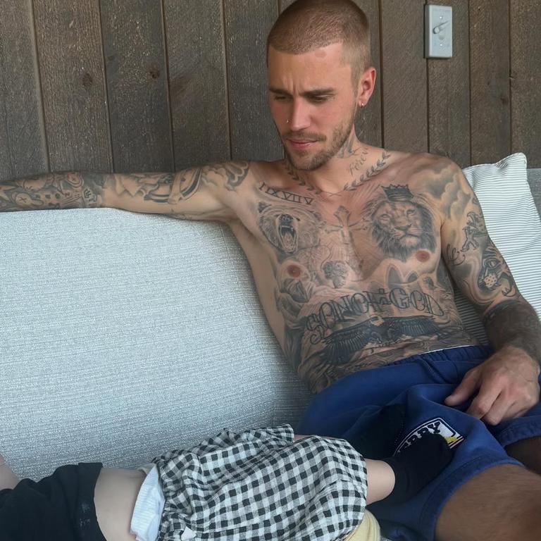 The singer shared a snap sharing a couch with the baby boy.