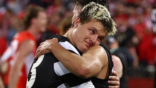 An emotional Jack Ginnivan and Nick Daicos embrace after the one-point loss to Sydney. Picture: Michael Klein