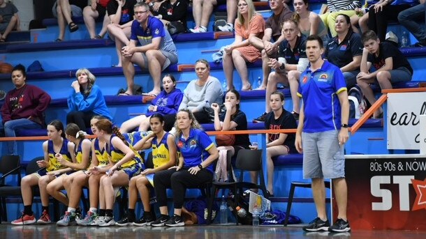 Townsville Flames coach Tim Duroux and the team.