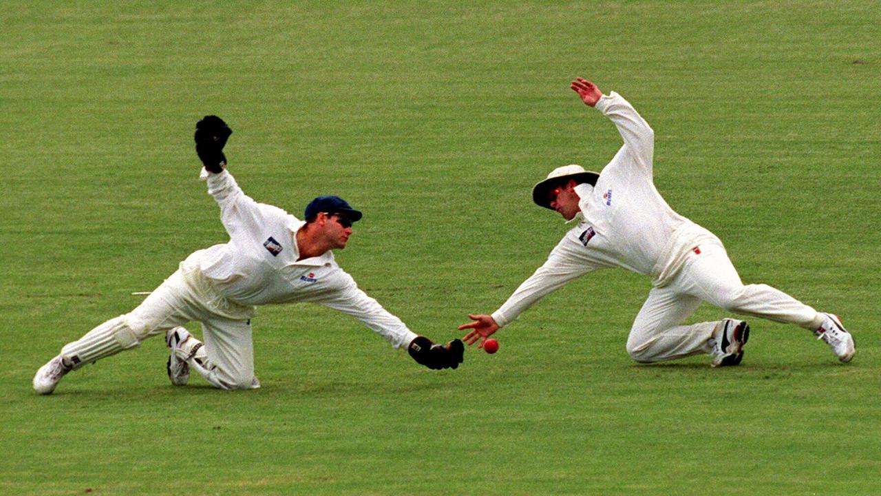 This must have been the photo Mark Taylor (right) chose on his application form for commentating the diving.