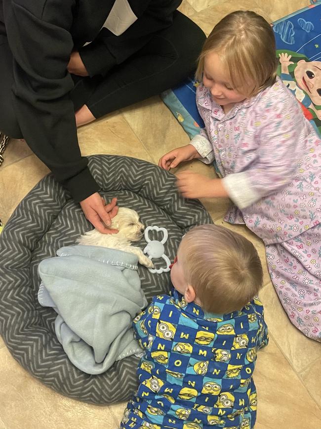 Rita Manera’s children with their new puppy Leo. Picture: Supplied by family