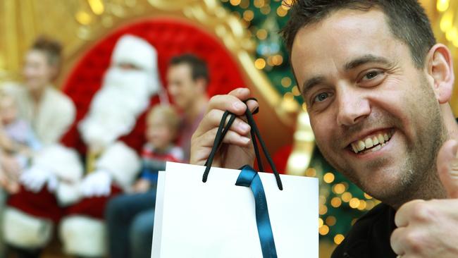 Christmas shopper Paul Matthews, 35, enjoys shopping for his wife.