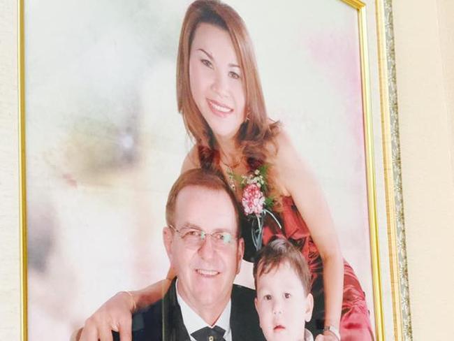 A family portrait of Andrew, his wife Ning and son Jason killed in the pool tragedy.