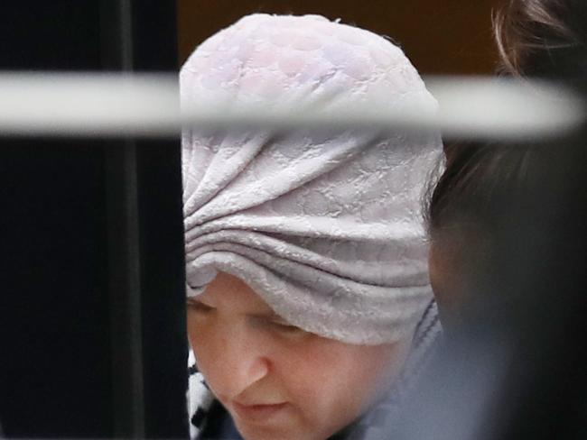 Malka Leifer is taken from the North Melbourne Police Station into a police van after her video link court case. Former Principal of a Jewish Girls School in Melbourne, Malka Leifer, who fled to Israel and has been returned to Melbourne to face sexual abuse charges. Wednesday, January 28, 2021. Picture: David Crosling