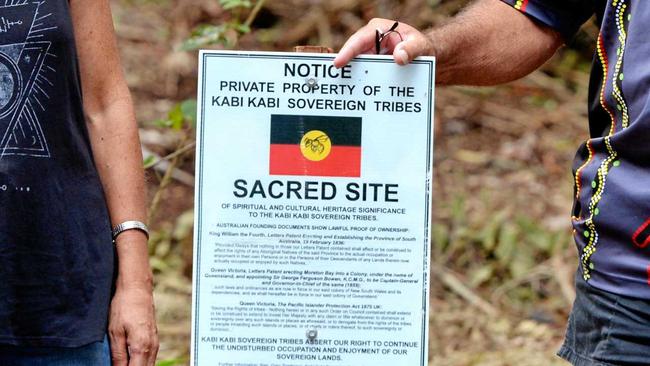 DISPUTE: A sign warns visitors to the site that it is owned by the Kabi Kabi Aboriginal people and not, as officially determined, by the Transport and Main Roads Department. Picture: Patrick Woods