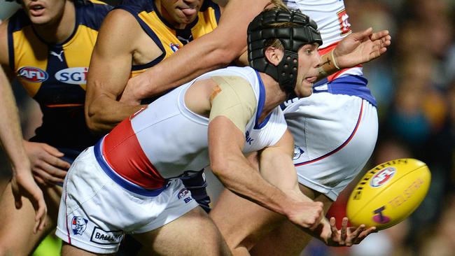 Caleb Daniel fires out a handball against West Coast. Picture: Daniel Wilkins