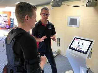 FITNESS: XBody Australia director and Summit Fitness owner Matt George with Northern Star journalist Harrison Astbury, demonstrating the new Electro-Muscular Stimulus (EMS) technology now available in the area. Picture: Javier Encalada