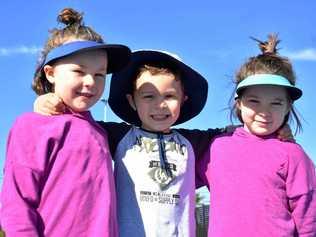 Isabel Cook, 6, Jake Hoffmann, 4, and Jessica Cook, 4 , at Maranoa Basketball Association's holiday netball clinic. Picture: Ellen Ransley