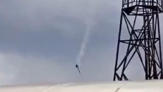 This video grab taken from the footage posted on a Wagner linked Telegram channel shows a plane falling in the sky near the village of Kuzhenkino, Tver region. Picture: Telegram/AFP.