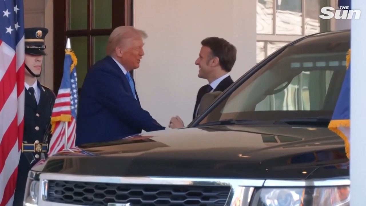 Trump & Macron locked in awkward tug-of-war handshake ahead of Ukraine talks