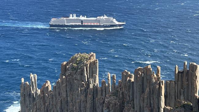 A cruise ship sails past Cape Raoul on the Tasman Peninsula. Picture: Philip Young