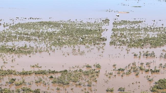 Homes and stations have been left devastated as rain continues to fall in catchment areas sending more floodwaters into Burketown and its surrounds. Picture: Supplied