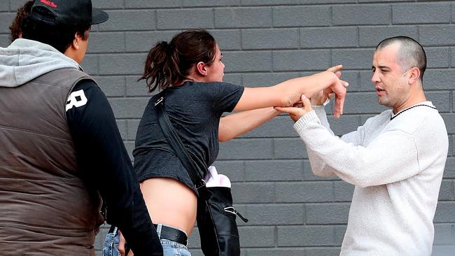 The fracas erupts at the floral tribute to Alexander Watts outside Elizabeth shopping centre.