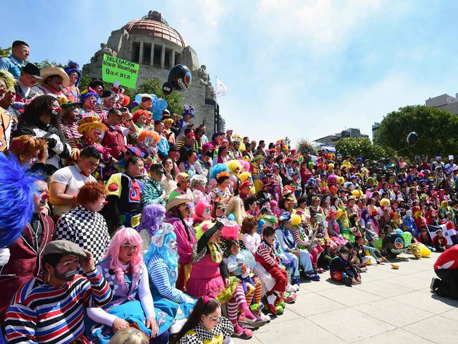 <!DOCTYPE html PUBLIC "-//W3C//DTD HTML 4.0 Transitional//EN" "http://www.w3.org/TR/REC-html40/loose.dtd"><html><body><p>Clowns pose during the family photo at the XXI Convention of Clowns, at the Jimenez Rueda Theatre, in Mexico City on October 19, 2016. Picture: AFP PHOTO / Alfredo ESTRELLA</p></body></html>