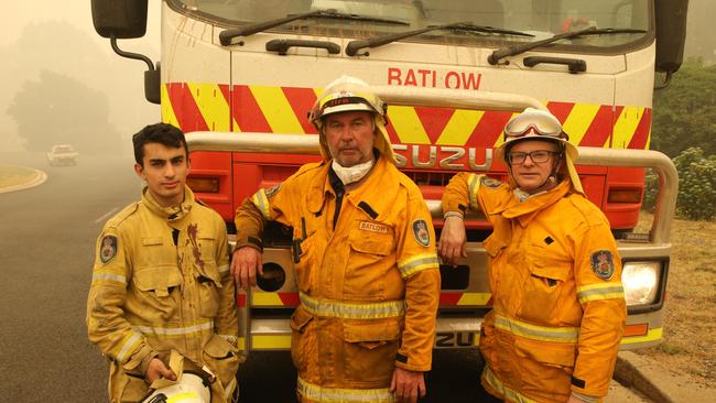 RFS firefighters Edmund Blenkins, Roger Watkins and Michael Blenkins. Picture: Rohan Kelly