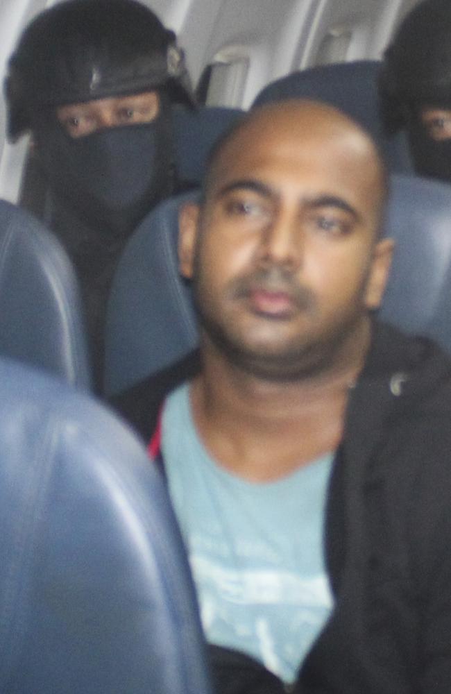 Bali Nine ringleader Myuran Sukumaran pictured on the plane as he is transferred from Bali to Cilacap, Java, and then Nusakambangan. Picture: Supplied