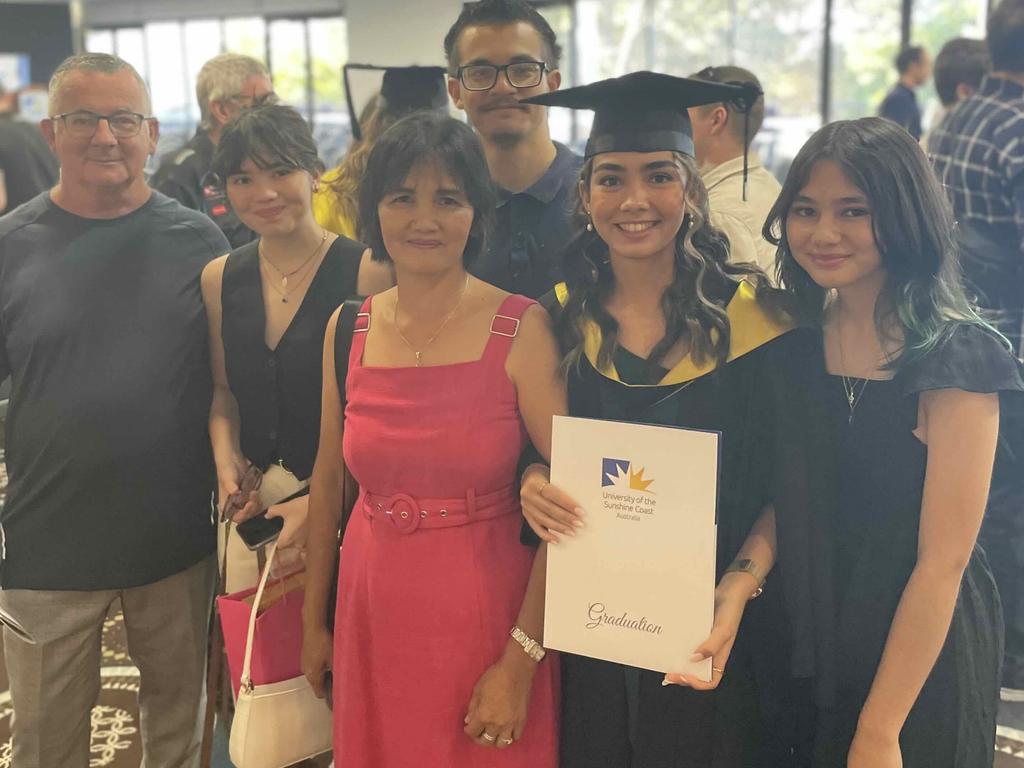 Jemma Parker and her family at the University of the Sunshine Coast graduation ceremony at the Beach House Hotel on October 12, 2023.