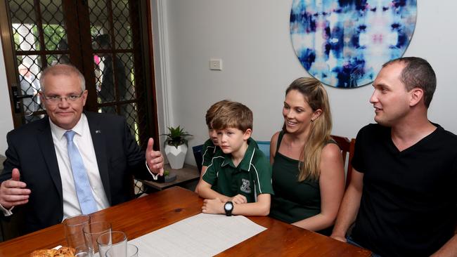 Former Prime Minister Scott Morrison chats Jeremy Neal and his wife Leearna Gibbs. Mr Neal was formerly involved with the Federal LNP. Picture: Anna Rogers