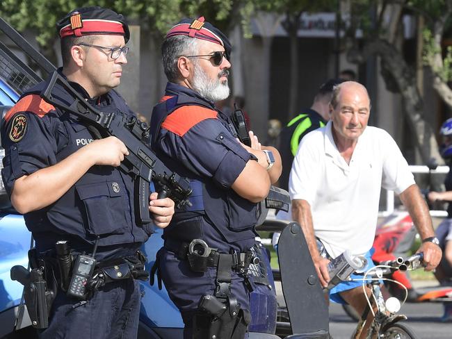 Spanish policemen stand guard in Cambrils. Picture: AFP