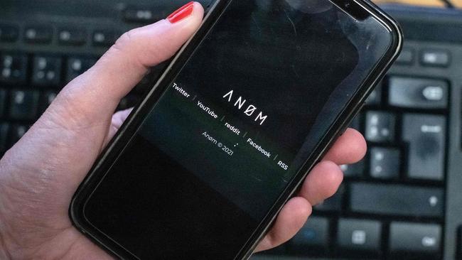 The ANoM app appears on the screen of a smartphone in Paris, on June 8, 2021. - Some 250 people were arrested in Sweden and Finland in the global sting on organised crime, authorities said on June 8, 2021, using phones planted by the US FBI, law enforcement officers were able to read the messages of global underworld figures in around 100 countries as they plotted drug deals, arms transfers and gangland hits on the compromised ANOM devices. (Photo by Olivier MORIN / AFP)