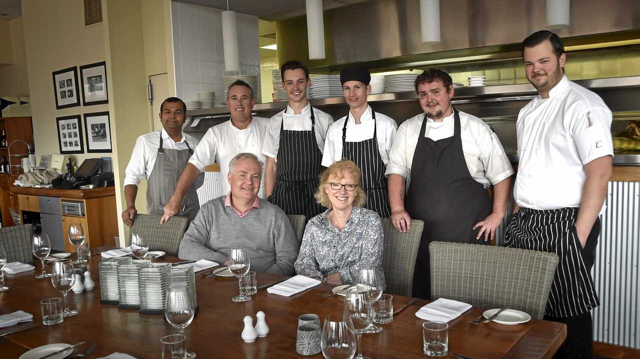 CELEBRATING: Encores Restaurant owners Mark and Meredith Rawlings (front) with their staff (from left) Alexander Omar Ibrahim, Clayton Costigan, Milo Rosetti, Oliver Brown, Samuel Riis and Stuart Parker. Picture: Bev Lacey