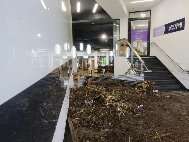 Flood damage at Channel Court shopping centre in Kingston. The automatic doors were washed off their tracks in the flooding. Picture: MATHEW FARRELL