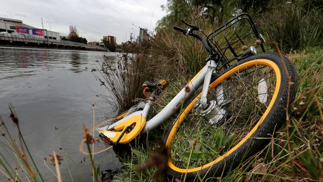 A discarded oBike in the Yarra River during the bikeshare scheme’s time in Melbourne. Picture: David Geraghty