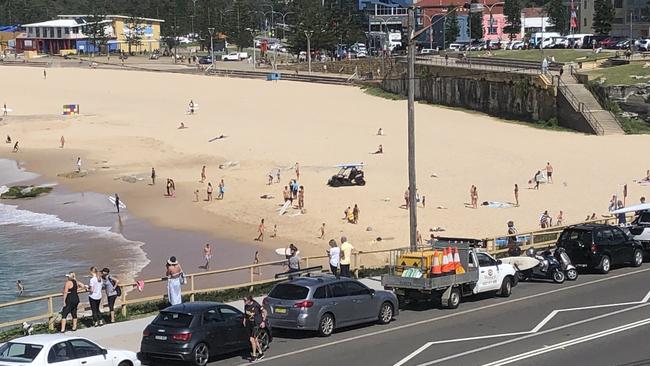 Lifeguards sounded the shark alarm and ordered people off the beach at Maroubra on Saturday. Picture: Rhett Watson