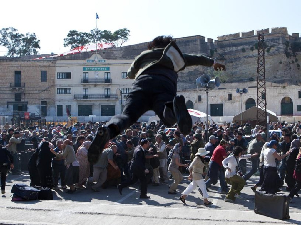 One of the infected leap into a crowd of tourists in "World War Z". Containing a pandemic is not currently possible, a simulation reveals. Picture: Paramount