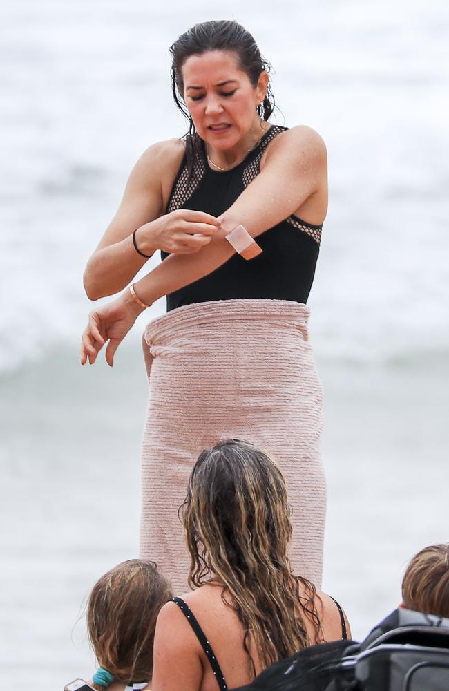 Even Princesses have to wear band aids occasionally. Princess Mary and her royal family hit Sydney’s Palm Beach for a dip before they head to Tasmania for an Aussie Christmas. Picture: Media Mode