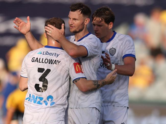 Auckland FC players celebrate their win over Central Coast Mariners. Picture: Scott Gardiner