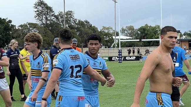 Norths under-18 captain Lauloto Salei, facing a teammate when he shakes his hand.