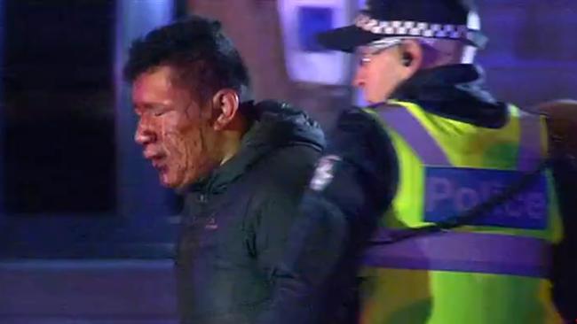 Screengrab showing a man injured during a brawl on Collingwood Street, Collingwood, Melbourne. 7News