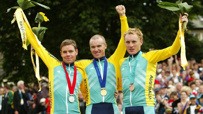 Road race medallists (from left) Cadel Evans, Stuart O'Grady and Baden Cooke. Picture: Leon Mead