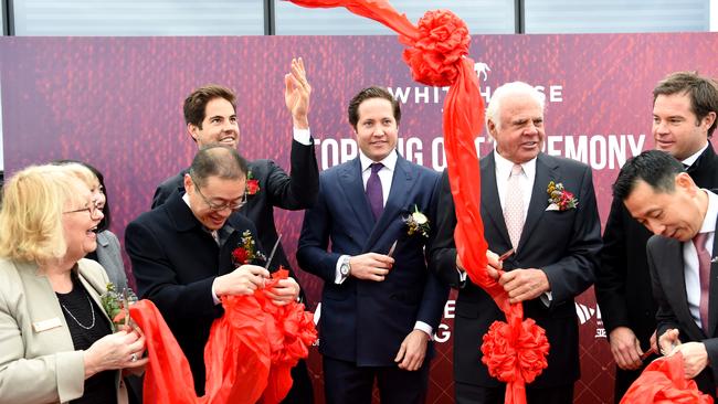 Whitehorse Mayor Denise Massoud and members of the Deague Group cut the ribbon at the Whitehorse Towers topping out ceremony. Picture: Nicole Garmston