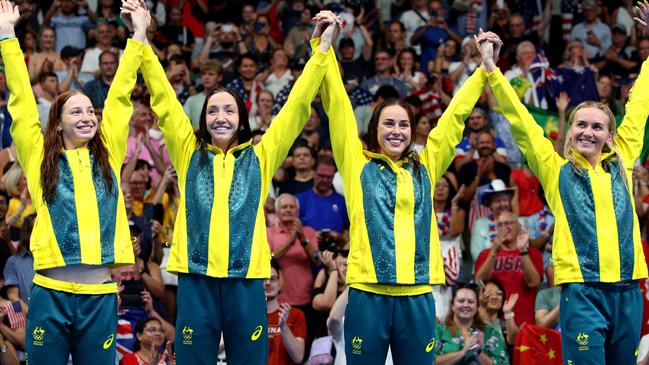 NANTERRE, FRANCE - AUGUST 01: Gold Medalists Mollie OÃ¢â¬â¢Callaghan, Lani Pallister, Brianna Throssell and Ariarne Titmus of Team Australia celebrate on the podium during the Swimming medal ceremony after the Women's 4x200m Freestyle Relay Final on day six of the Olympic Games Paris 2024 at Paris La Defense Arena on August 01, 2024 in Nanterre, France. (Photo by Adam Pretty/Getty Images)