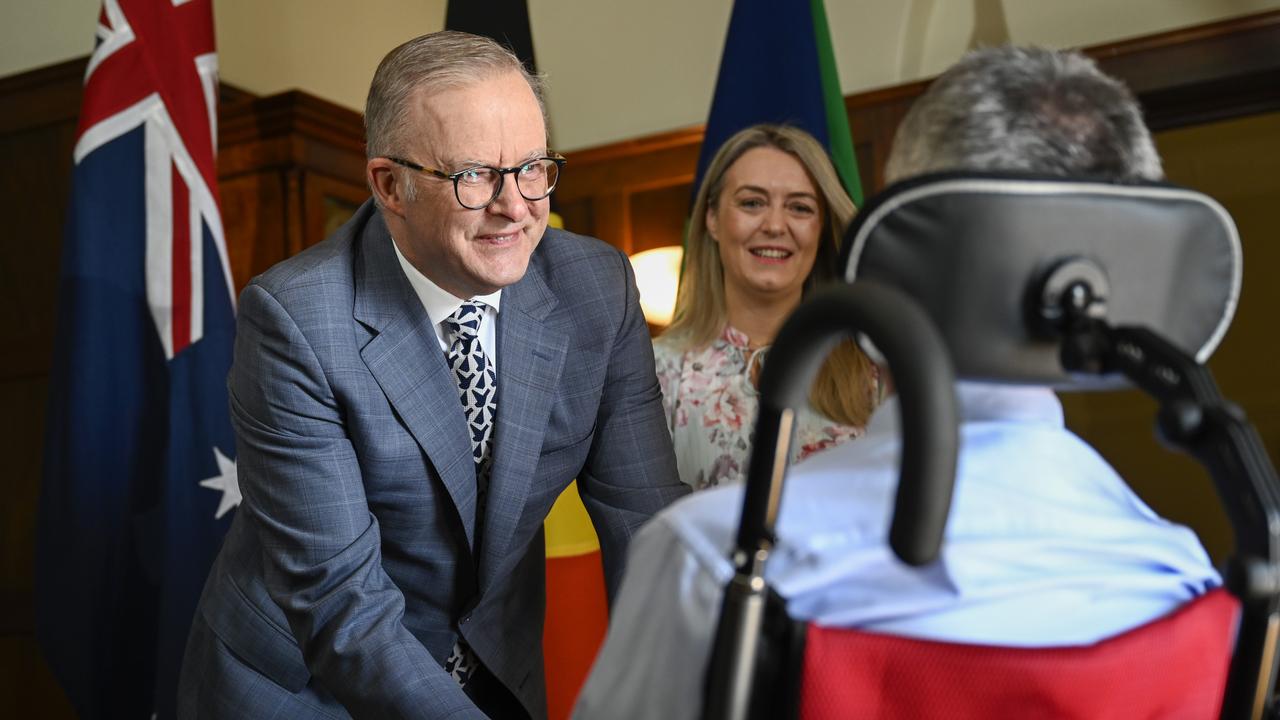 Prime Minister of Australia Anthony Albanese and Jodie Haydon welcome Neale Daniher to the 2025 Australian of the Year Awards morning tea at the lodge in Canberra. Picture: NewsWire / Martin Ollman