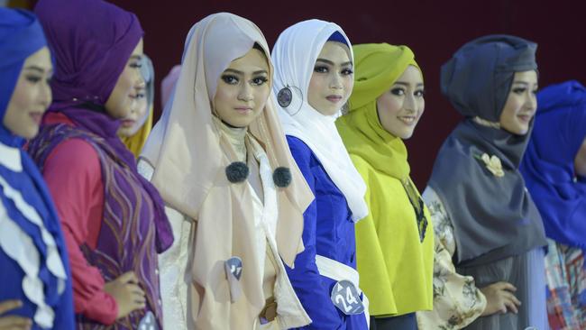 Modesty culture, like this hijab fashion show in Indonesia’s Aceh province, is born of misogyny. Picture: AFP Photo / Chaideer Mahyuddin