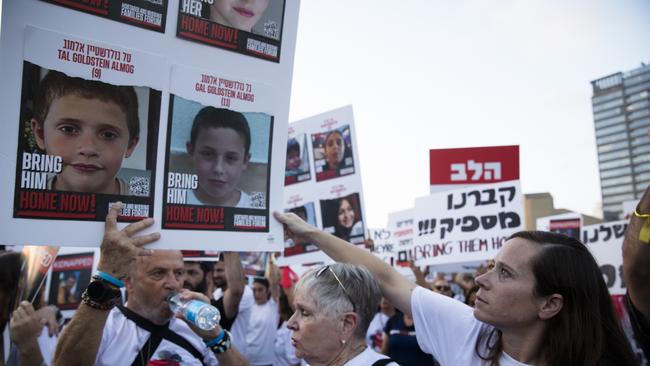 Family and friends of hostages taken from Kfar Gaza demonstrate in the Tel Aviv museum plaza on November 2. Picture: Getty