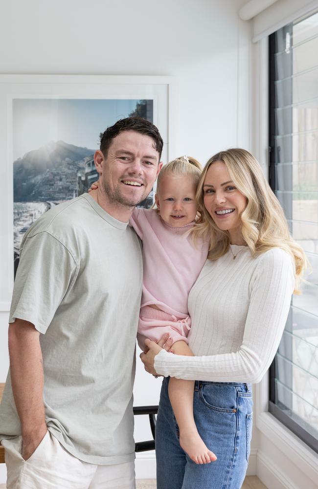 Lions co-captain Lachie Neale and wife Jules Neale at home with their daughter Piper, 2. The couple have revealed it took them 2.5 years to fall pregnant with Piper. Picture: David Kelly